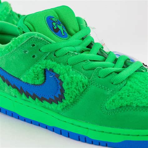 green fuzzy Nike dunks